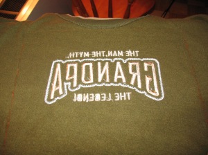 The sweatshirt, turned inside out, with the square marked on it (in orange) - note how close the design is to the shirt collar
